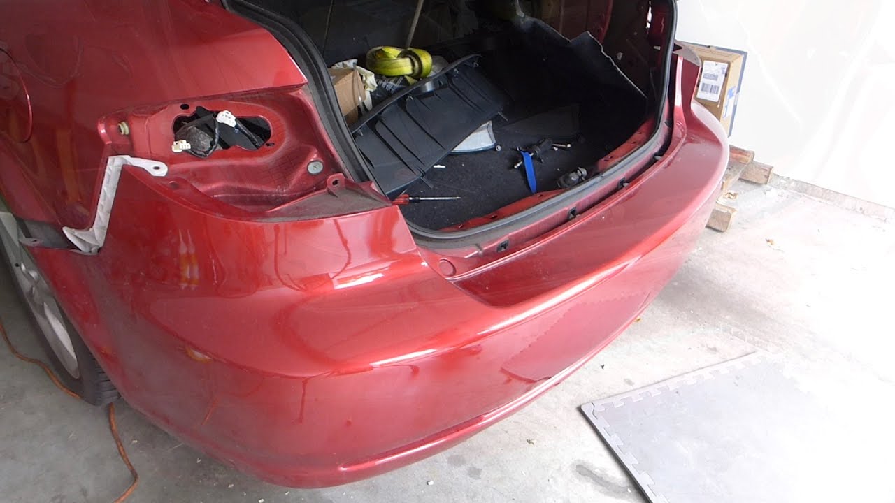 Снятие заднего фонаря и заднего бампера Mazda 6