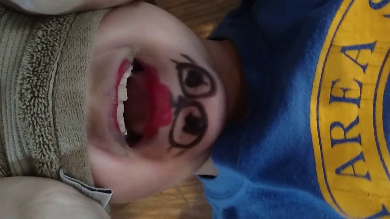 Upside-down face painted on Chin