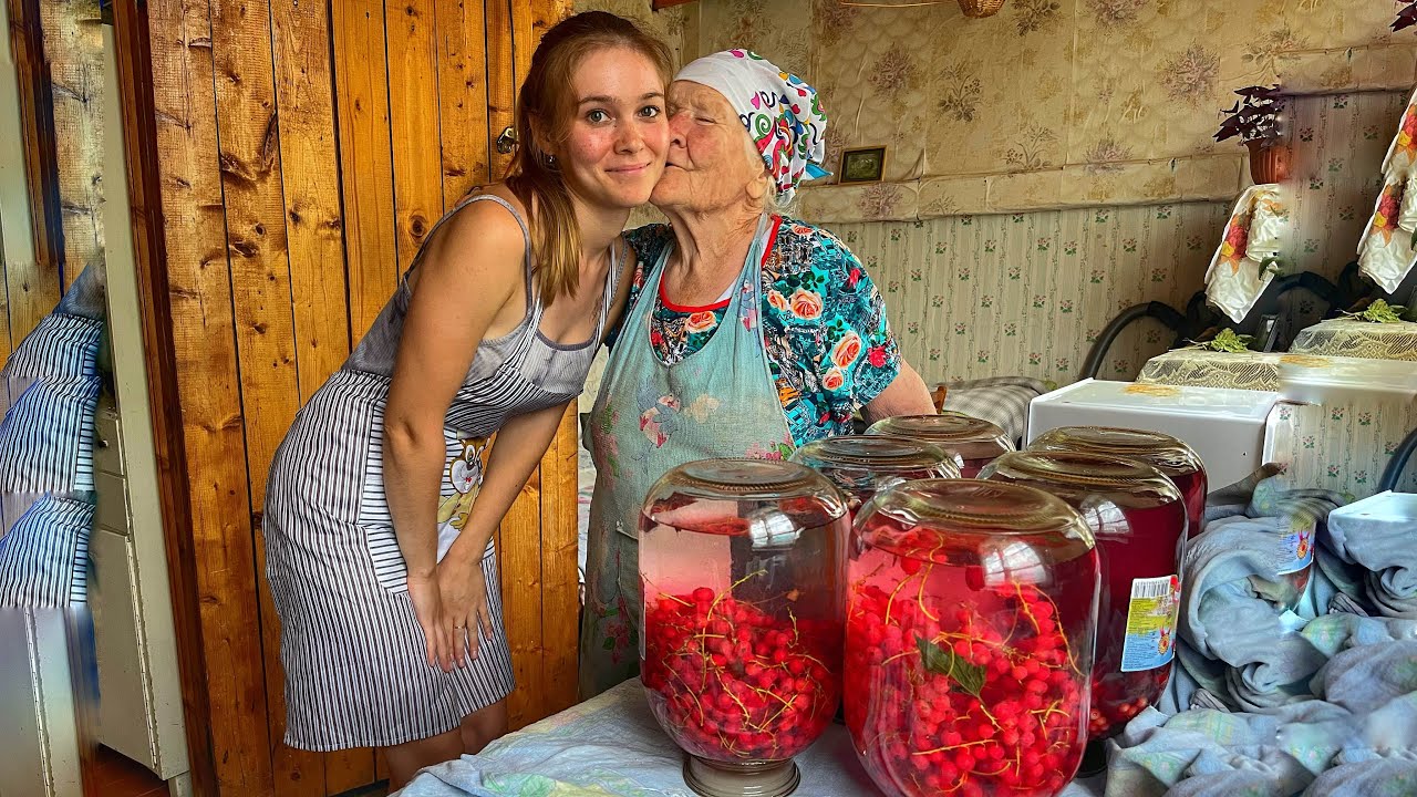 My grandmother teaches me how to make compote from berries