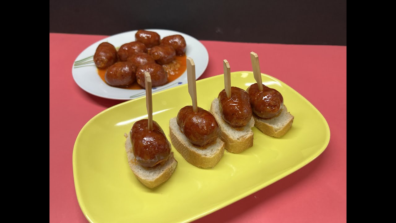 CHORIZOS CON CEBOLLA A LA CERVEZA