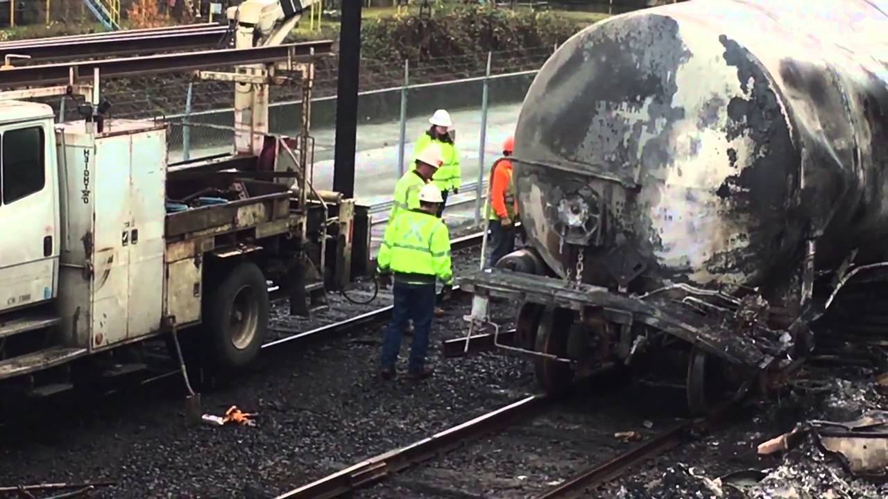 Cleanup of fatal truck-train crash and fire on US 30