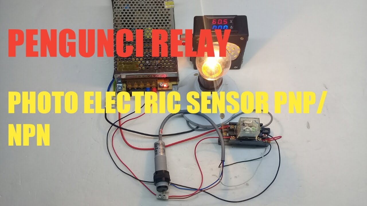 PENGUNCI RELAY MENGGUNAKAN PHOTO ELECTRIC SENSOR  PNP/NPN