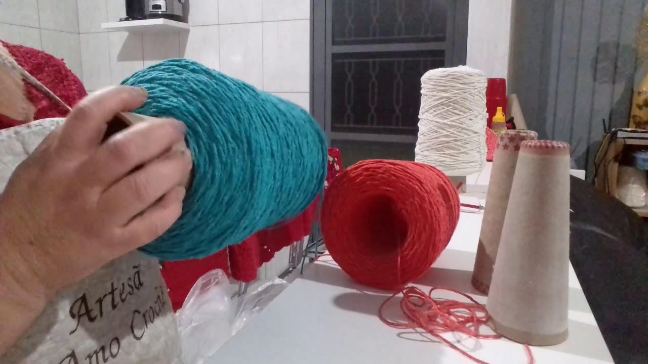 Técnica para tirar cone do rolo de barbante