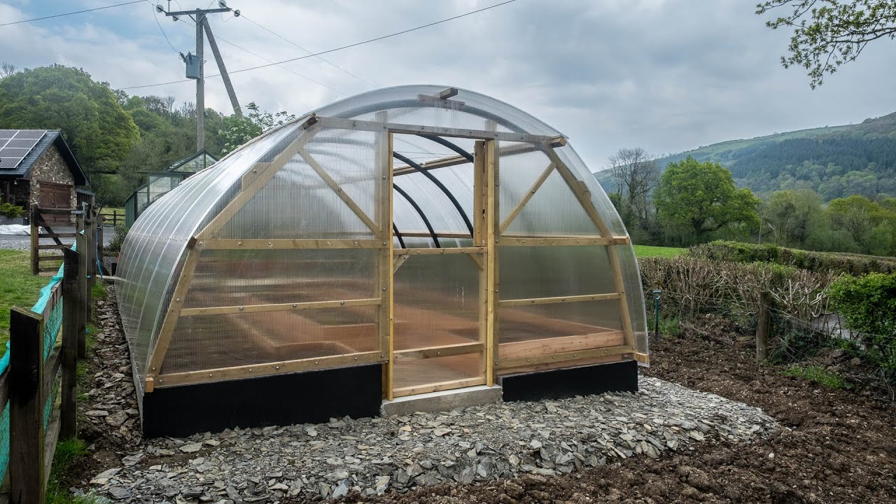 How I built a Polycarbonate Tunnel Greenhouse. Known commercially as a Polycrub or similar.