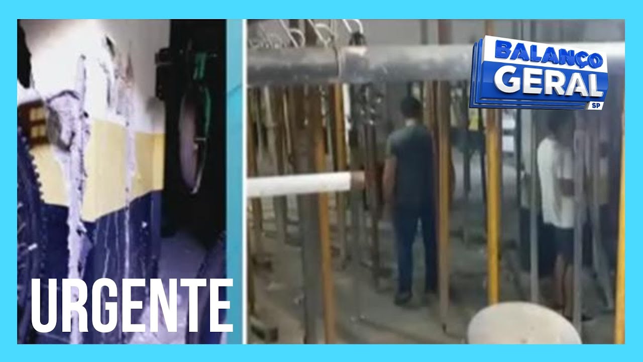 Operários colocam estacas para sustentar prédio com risco de desabamento no litoral de SP