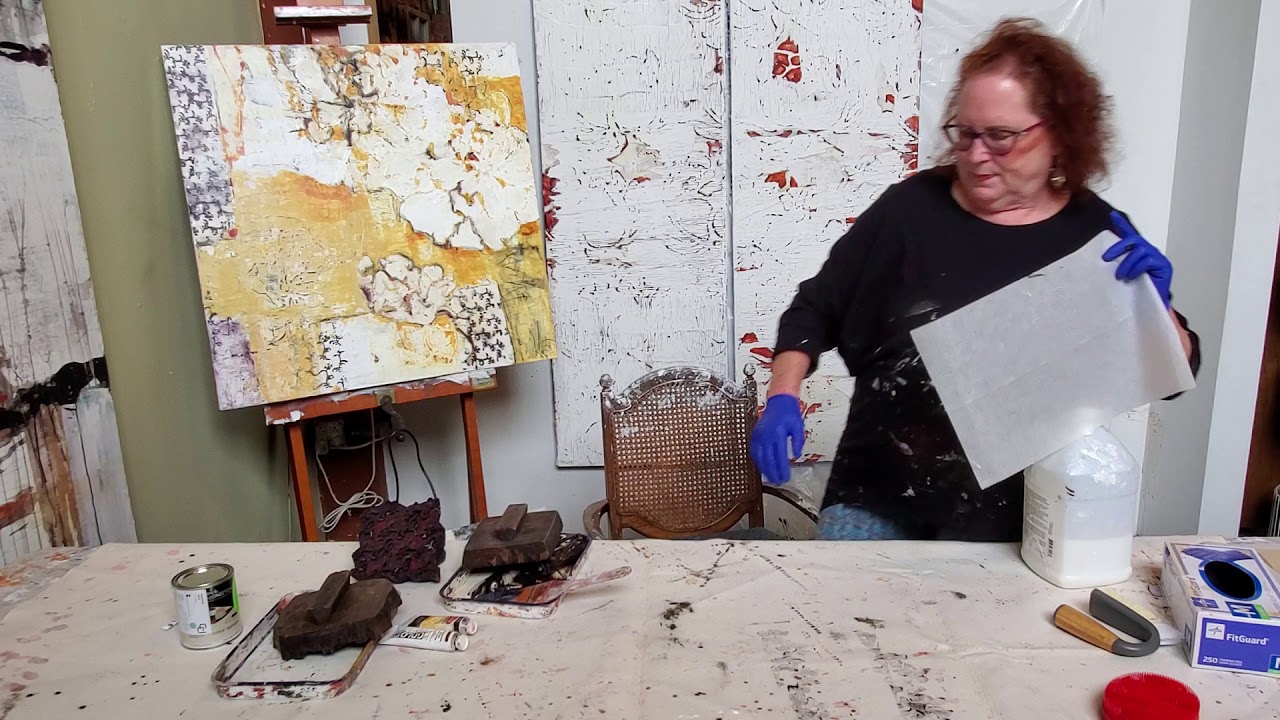 Making collage paper with wooden textile print blocks