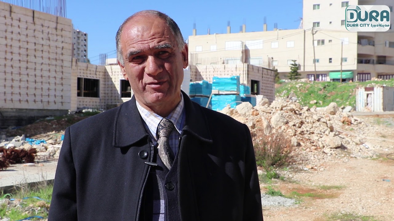 جامعة القدس المفتوحة فرع دورا تُسقف الطابق الثاني من مبناها الجديد