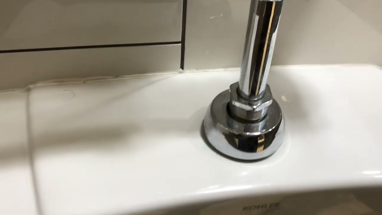 Damon is currently using the public bathroom