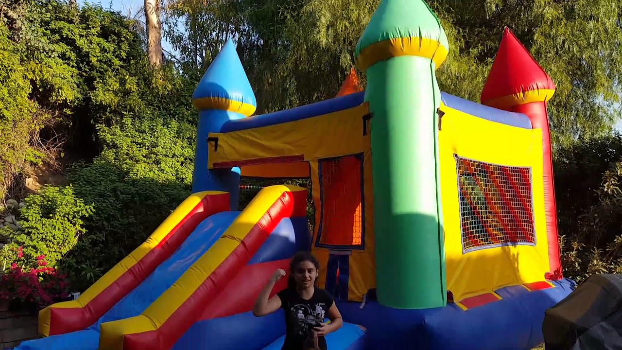 Fun in the Jumper castle with a slide