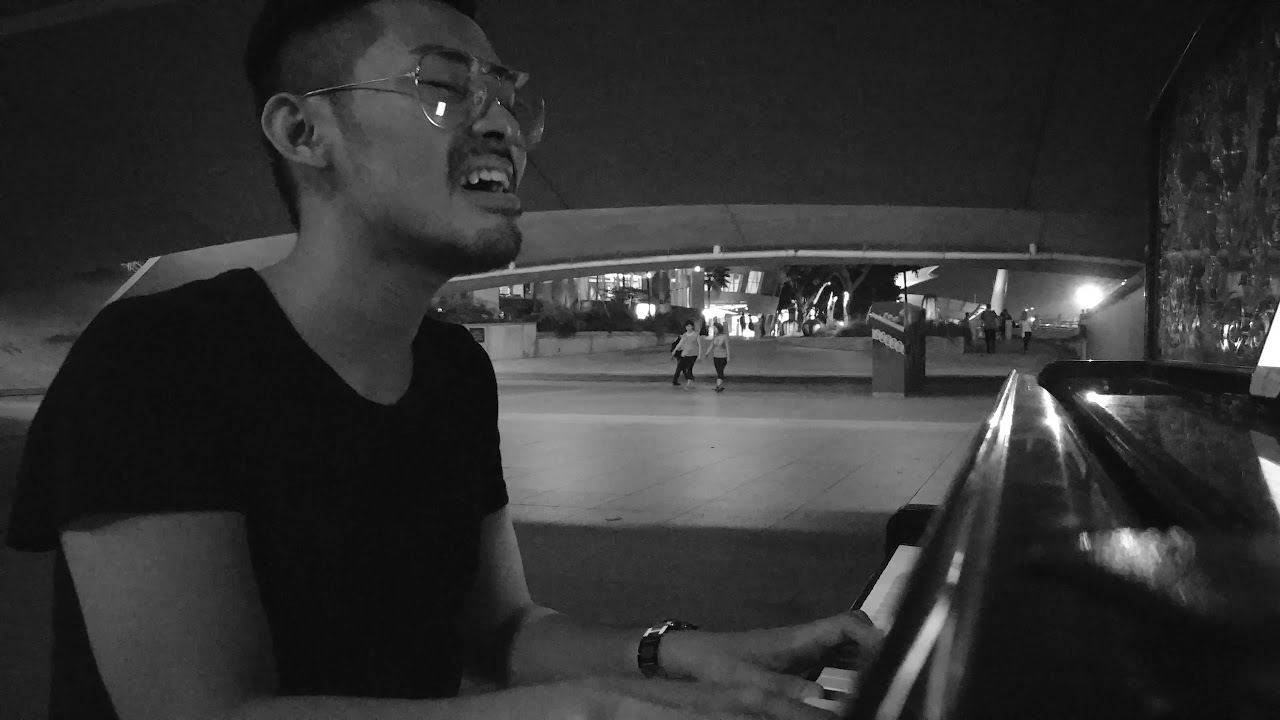 Oceans (Where Feet May Fail) cover - Cyril Toh under the Esplanade Bridge