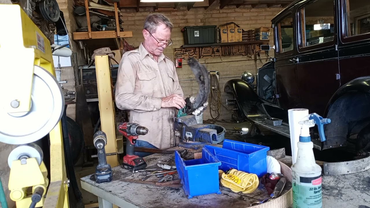 Relining brake shoes on a 1929 Packard using Ford rivets and tools