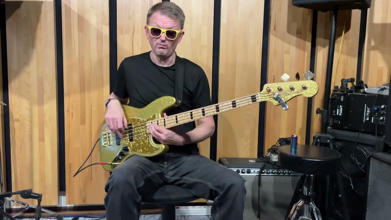 SD Custom golden bass. Bridge pickup mode, tone 70% off. Bass cover.