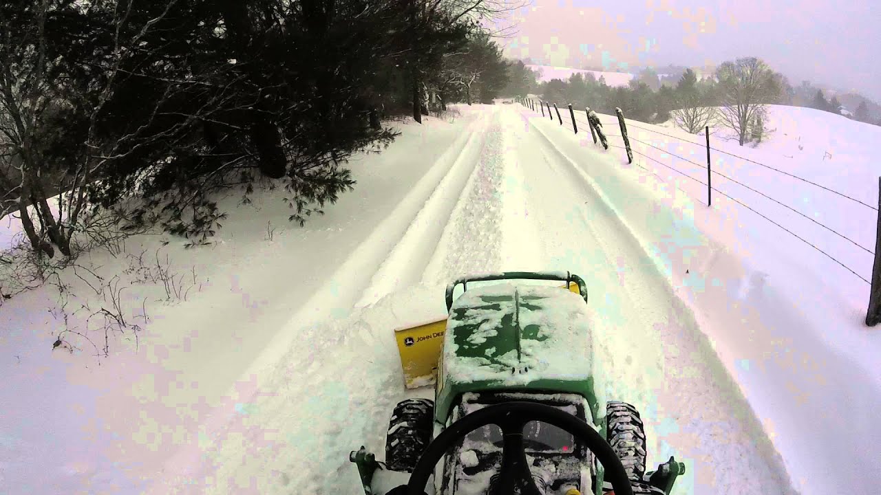 John Deere 1025r - plowing snow