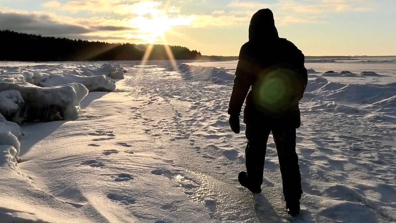 Frozen Baltic Sea. Winter Hiking in Estonia