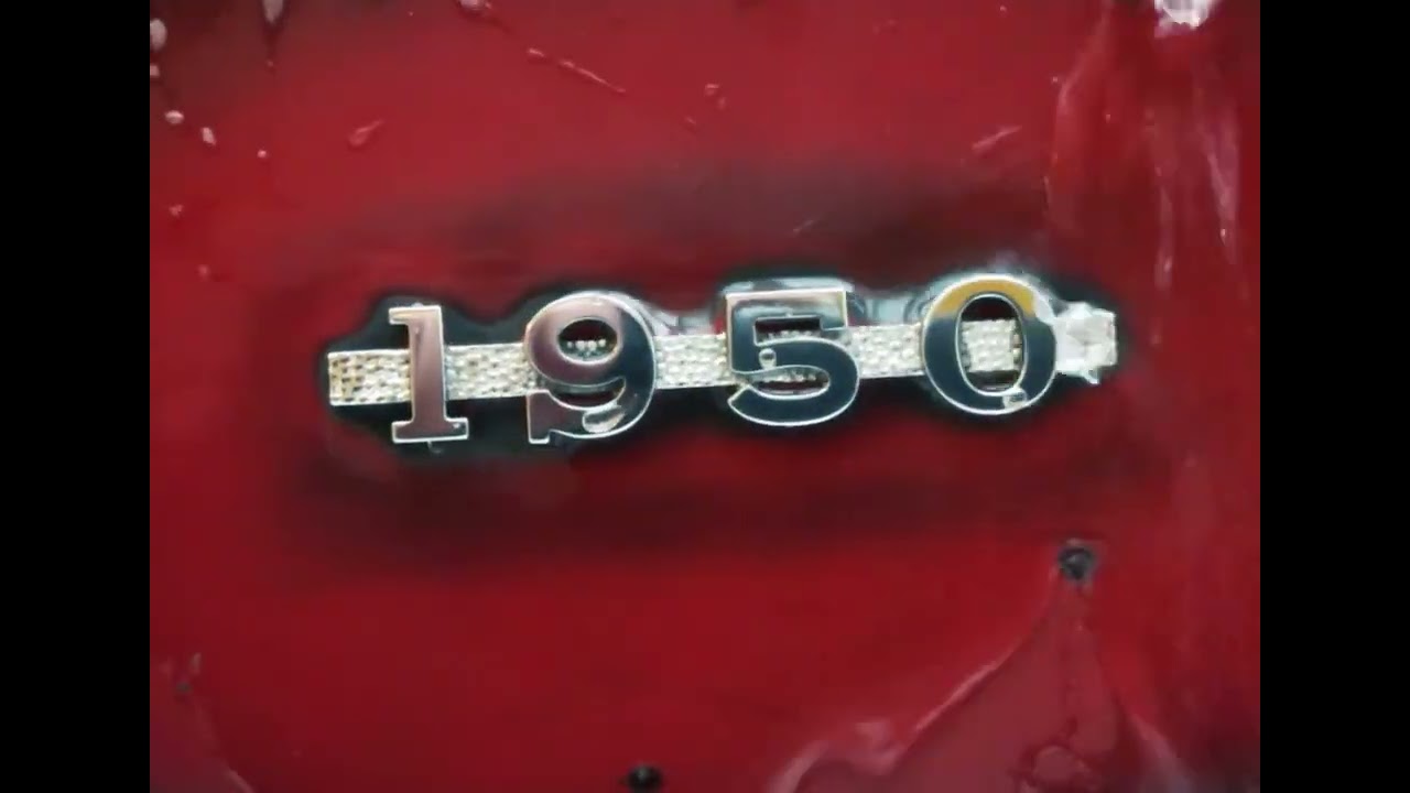 MGA 1950 Badge - post polish rinse.
