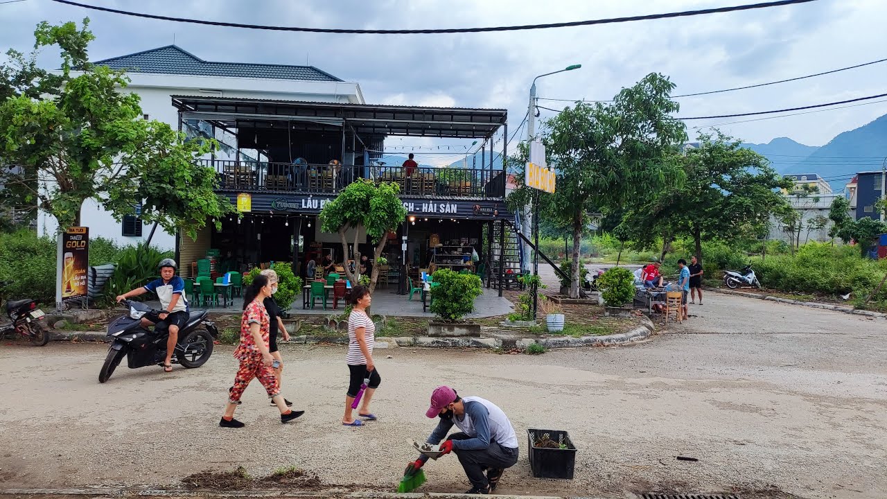 Volunteer to clean up the sidewalks and drains in the beautiful neighborhood using simple tools.