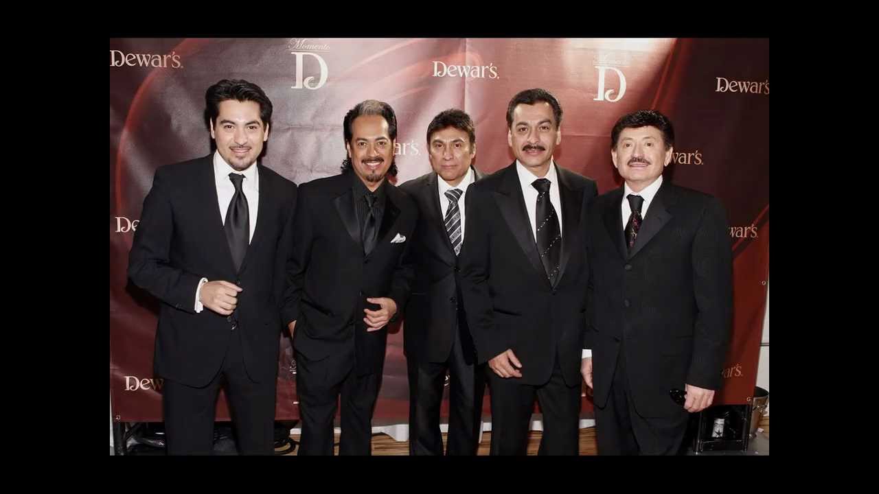 atrapado - los tigres del norte