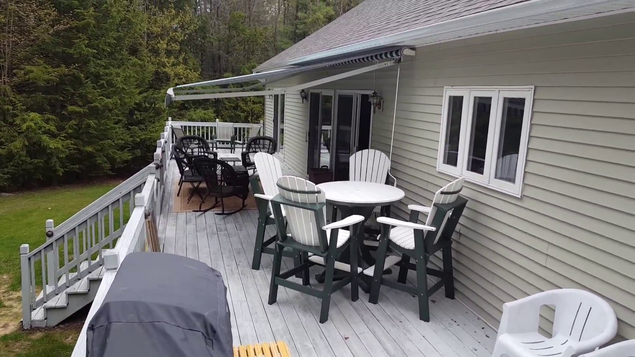 Gilford NH. Sunesta Sunstyle Motorized Awning with wind sensor