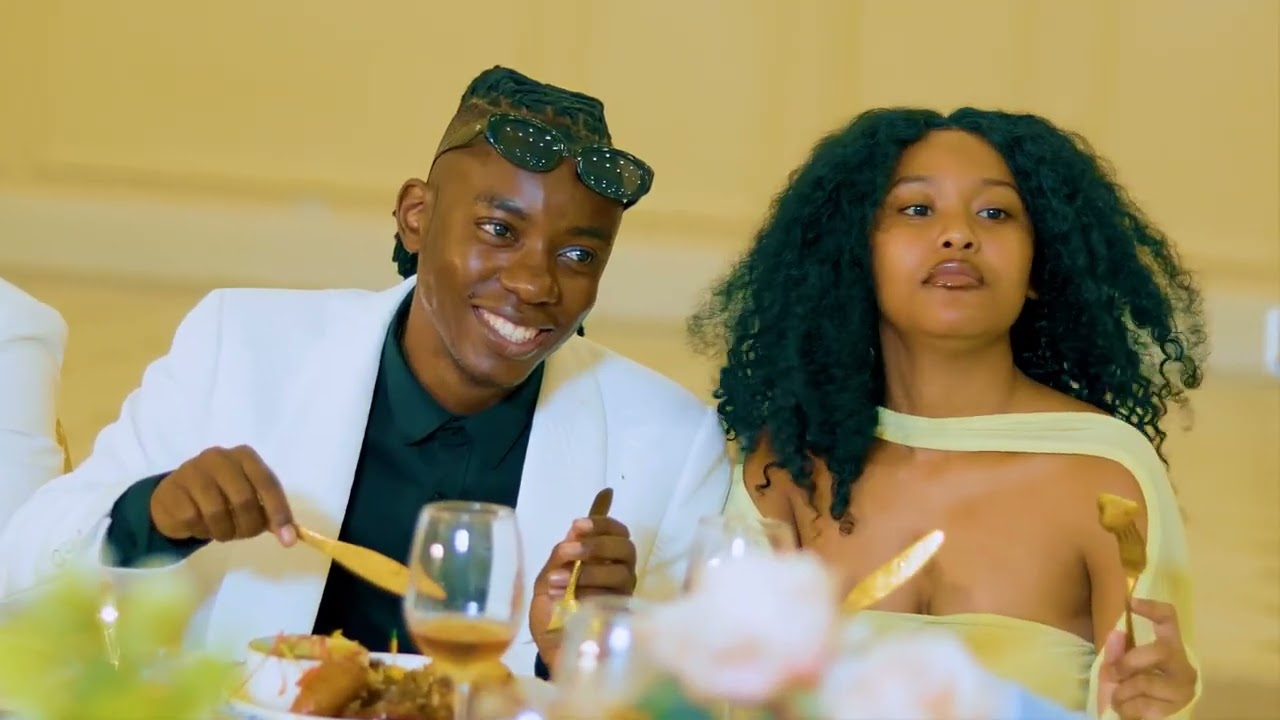 Dizmo ft Reuben_-_mpeniko Ifindingile official music_video(mp4)