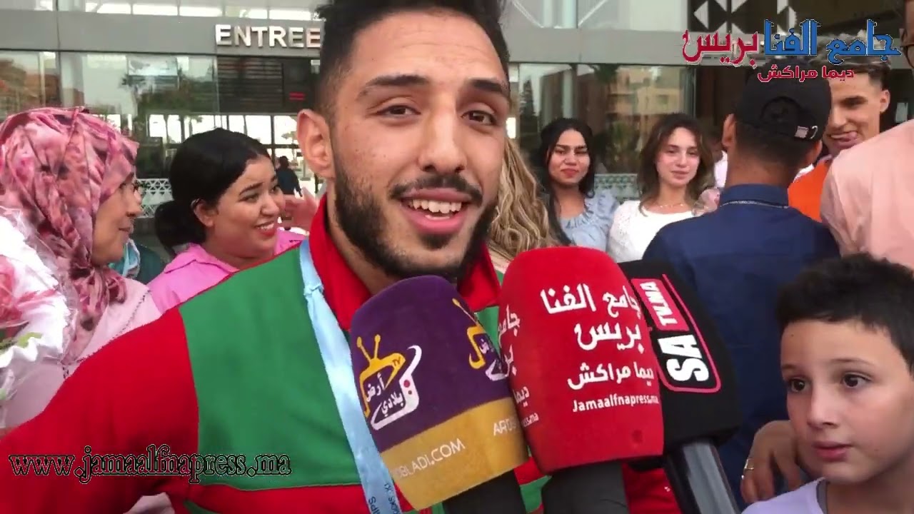 للحضة وصول البطل الإفريقي أنس الجزولي الحاصل على المدالية الذهبية في للكيك بوكسينغ وزن 60 kg