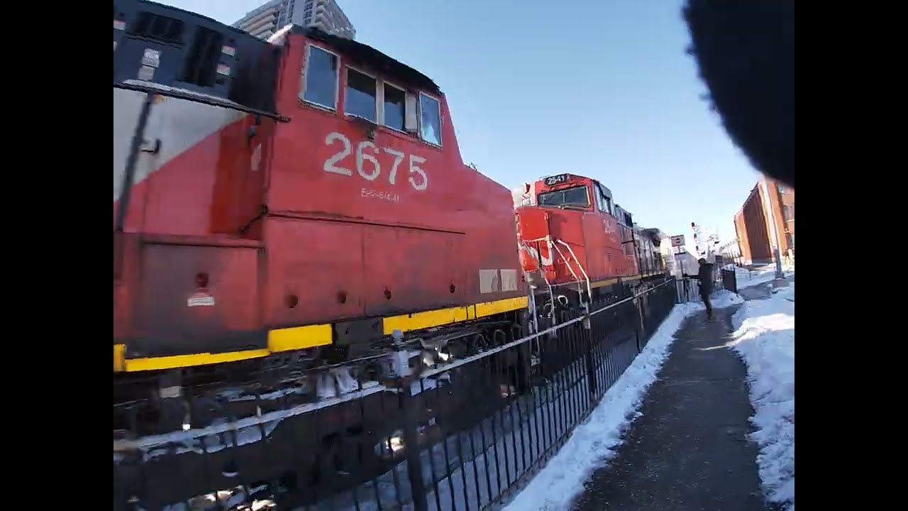 CN 2223 lead with CN T129 with 2 C44-9Ws with 1000 MPH of speed over the rails.