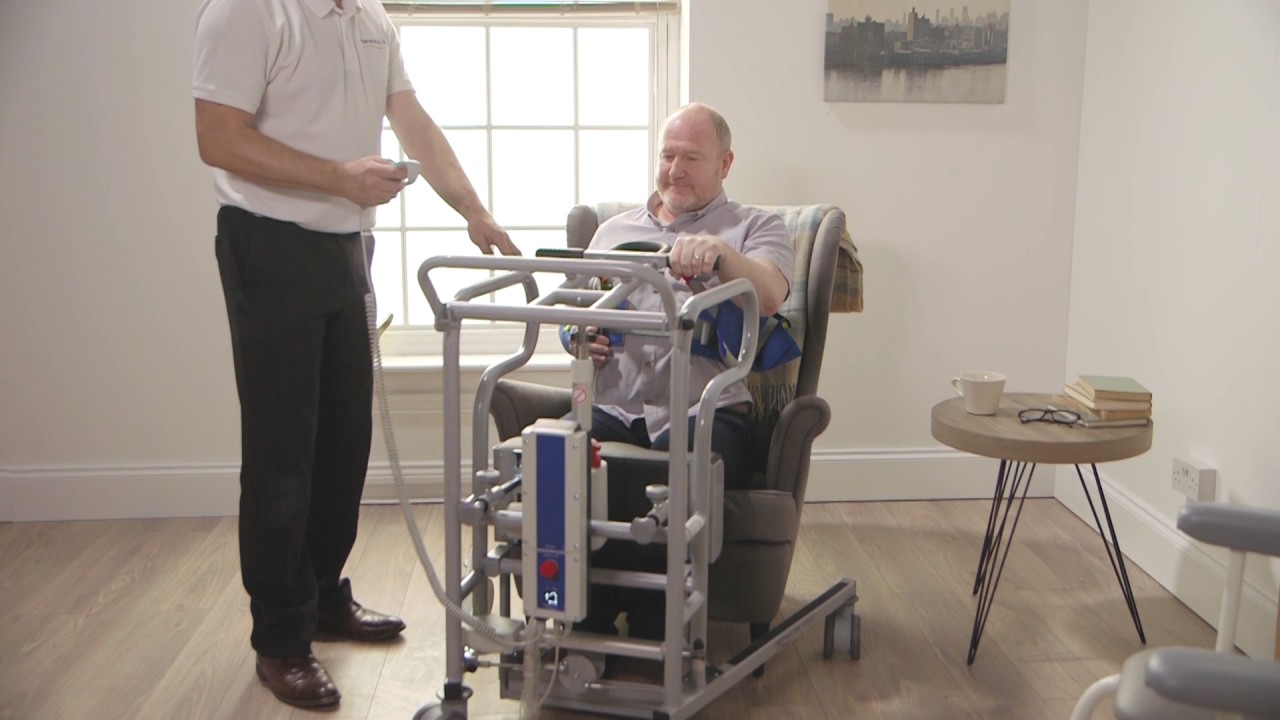 Transferring a person from armchair to showerchair ft. SA160C, Thoracic Sling and T40B Shower chair