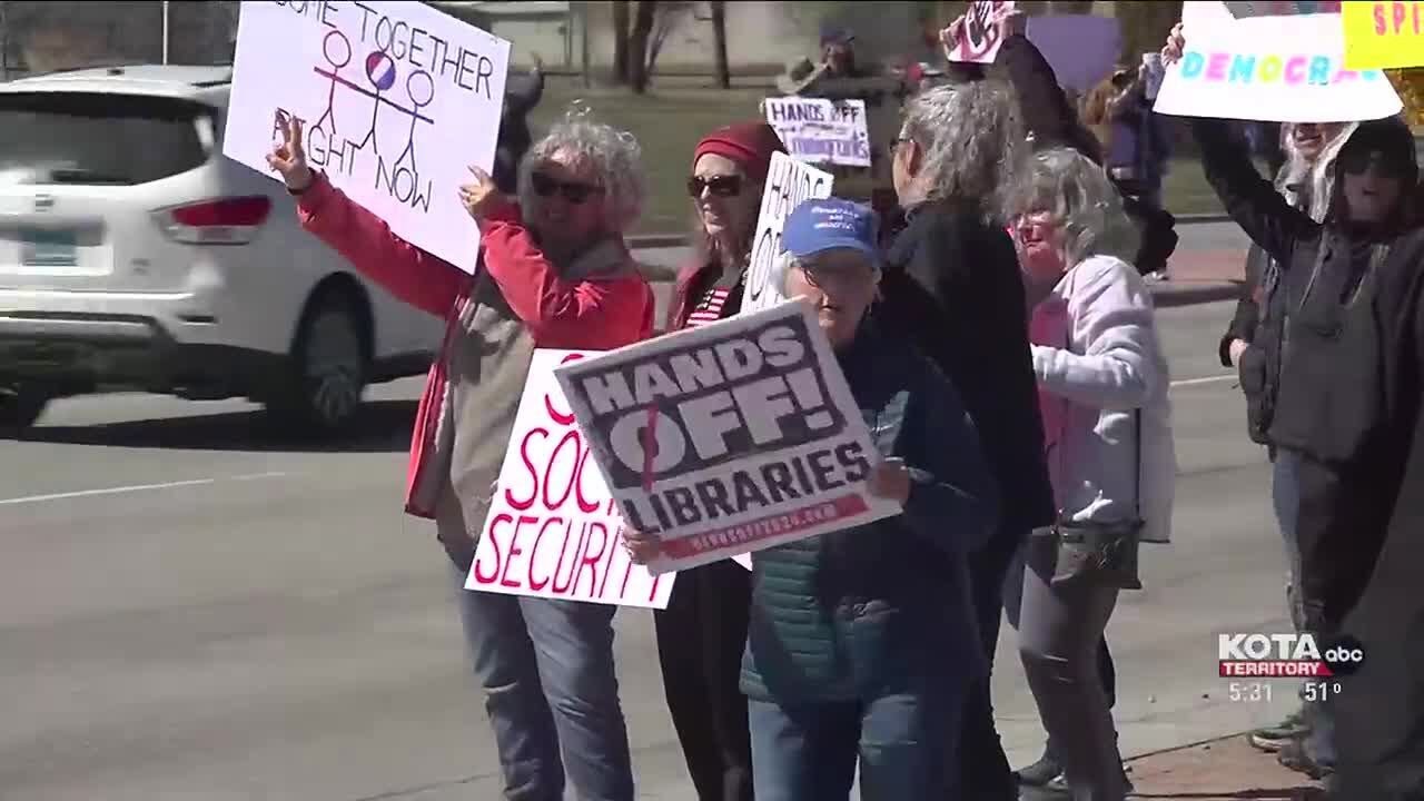 Local residents join in on nationwide protest against Trump administration