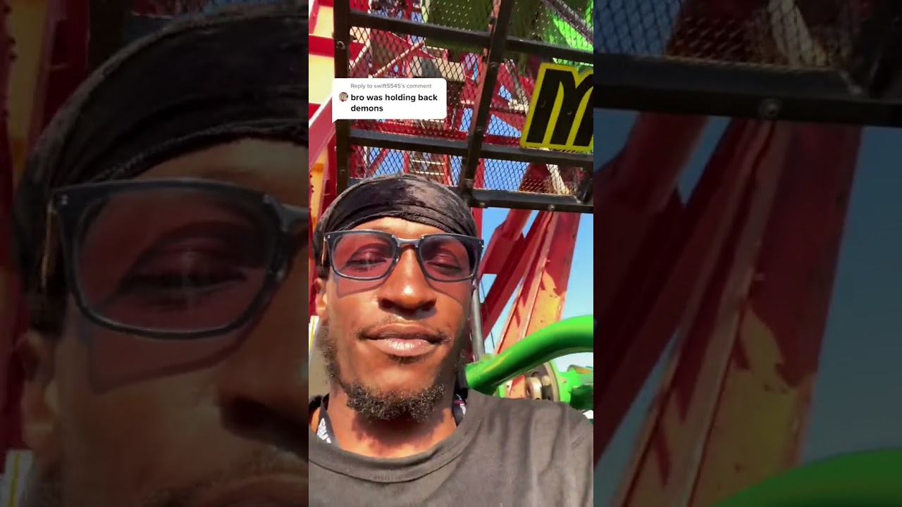 Guy rides on Lex Luthor Drop of Doom and has absolutely no reaction at all!