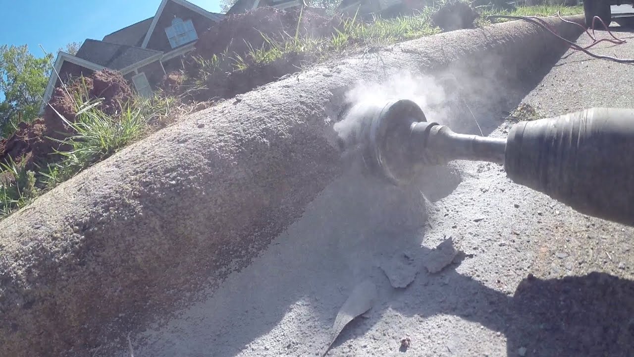 The CURB HOLE, You need this for your FRENCH DRAIN. How to Do It Yourself.