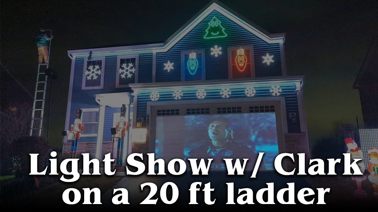 Christmas Vacation light show w/ Clark Griswold on 20ft ladder and Cousin Eddie mannequin