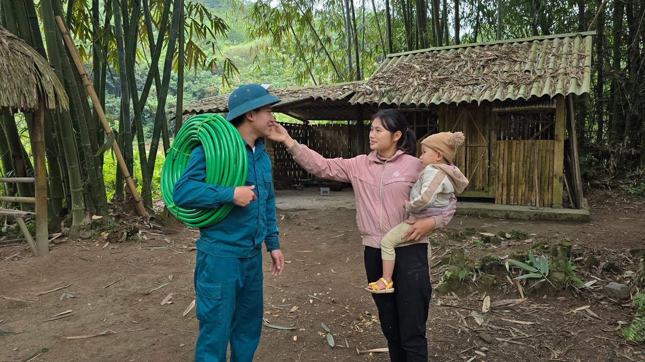 The kind police officer helped the poor girl and the orphaned child get clean water to use.