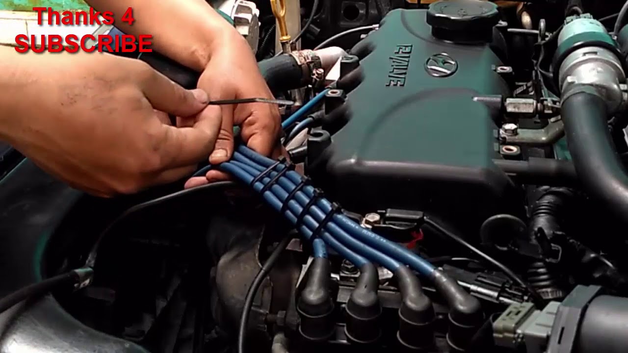 MERAPIKAN KABEL BUSI MOBIL DENGAN KABEL TIES