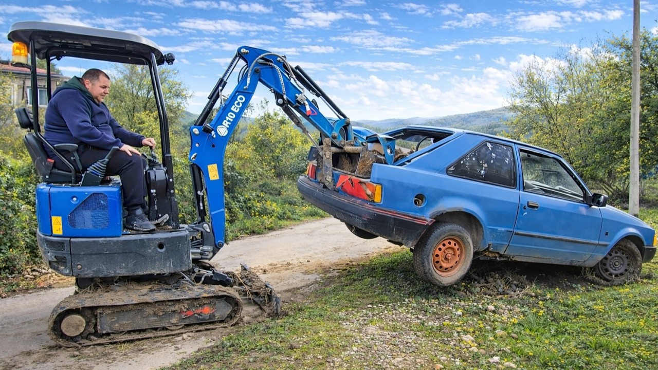Can a $2000 Mini Excavator Pull a Car Out of Mud?!