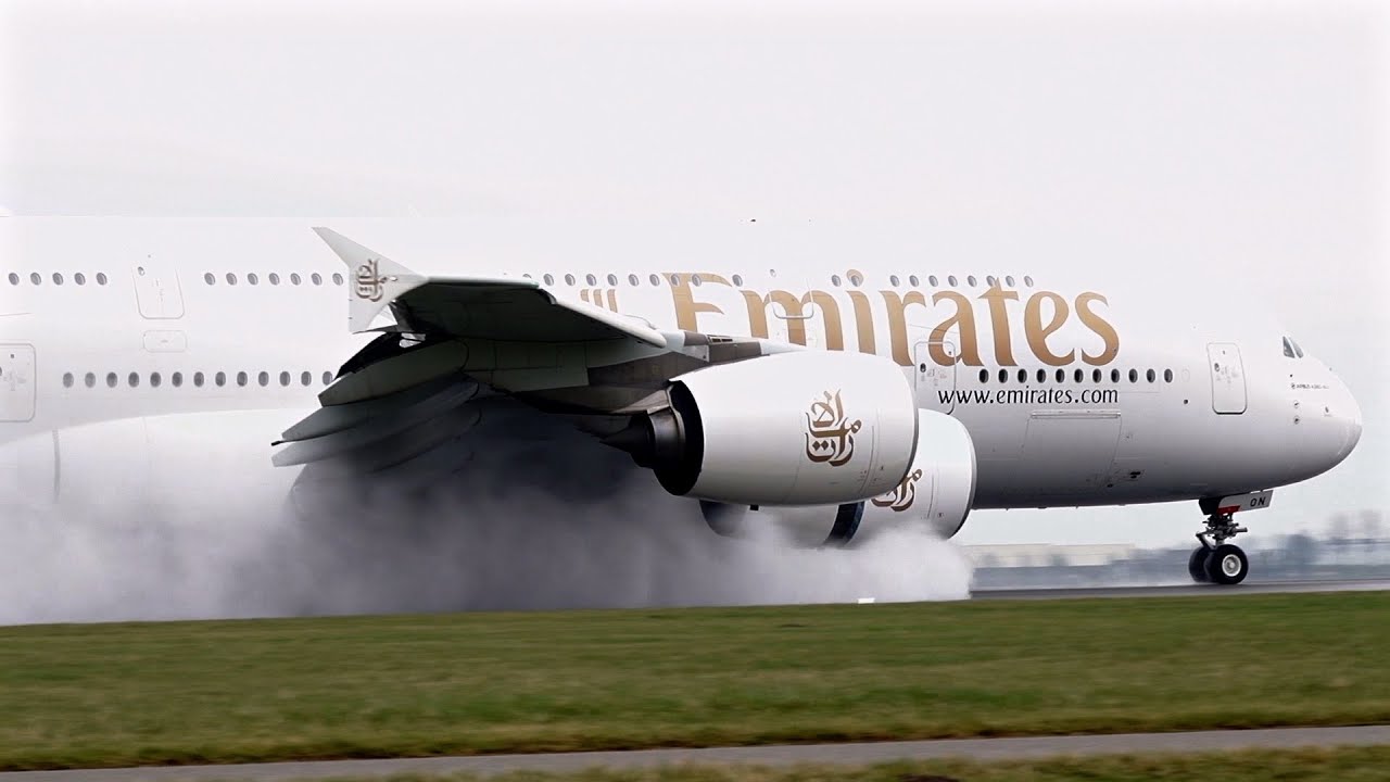AWESOME  WATER SPRAY A380-800 EMIRATES AT  SCHIPHOL AIRPORT