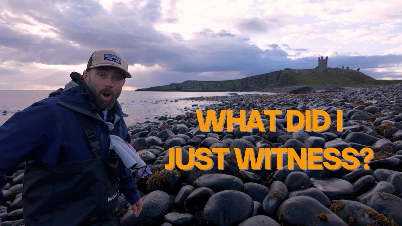 Taking on the Death Rocks at Dunstanburgh Castle to get the shot!