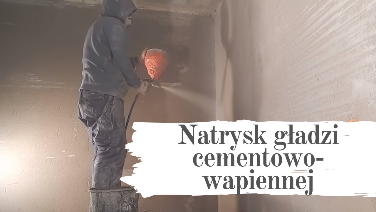 Natrysk gładzi cementowo-wapiennej, efekt końcowy tynku zacieranego piaskiem kwarcowym.