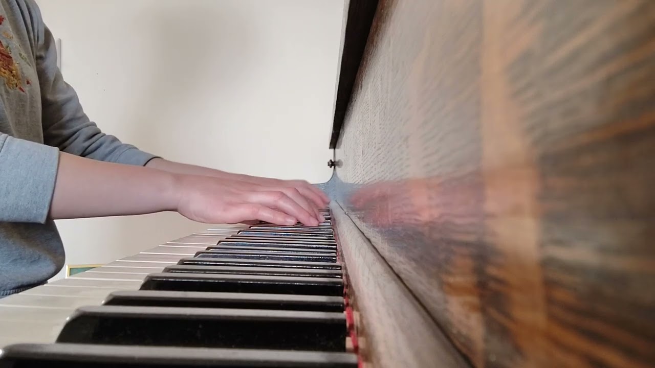 Sad song on old piano