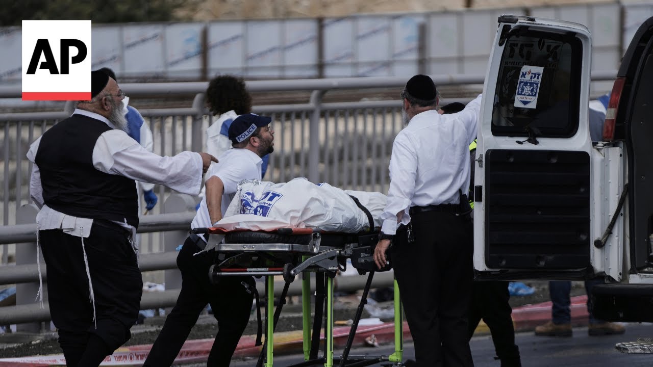 Palestinian gunmen open fire at Jerusalem bus stop, killing 6 people