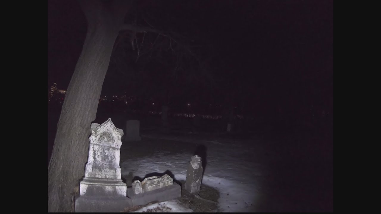 Exploring snowy graveyard at night alone...