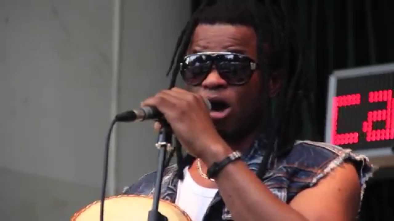 Ghanaian artist Friction with band at the Alltogether Festival in Holland