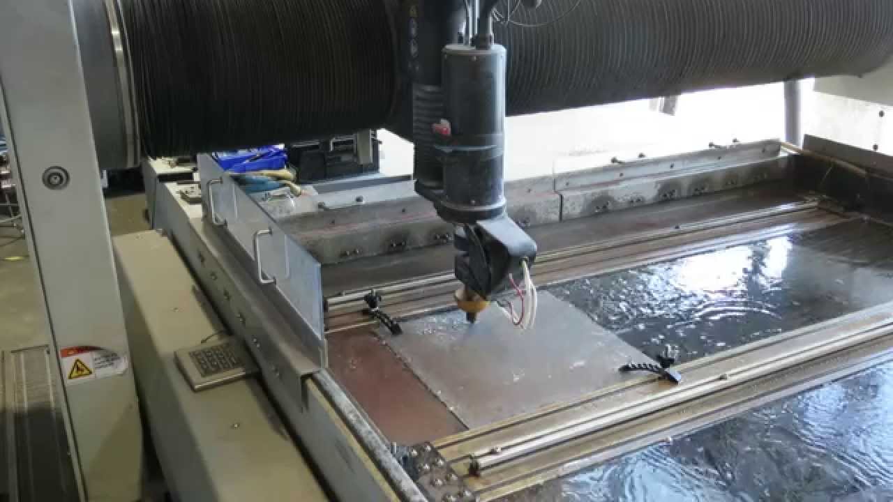 Cutting a stainless steel plate for Pinya 3 with a waterjet