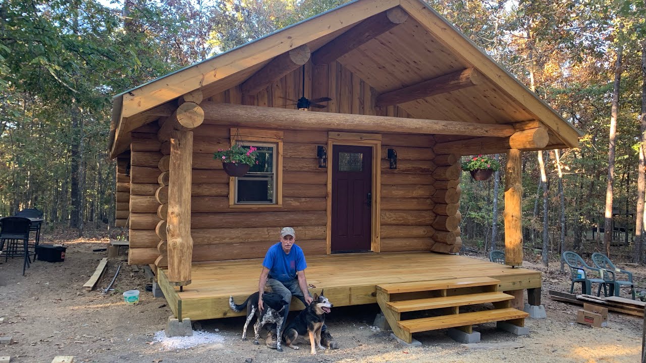 Log Cabin Build Part 30, building the porch, claw foot tub, countertops, shed for hot water heater