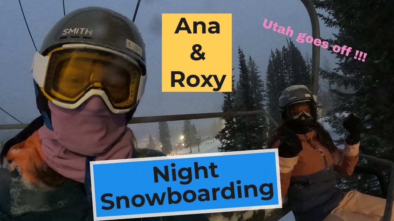 Two surfer girls night Snowboarding Utah