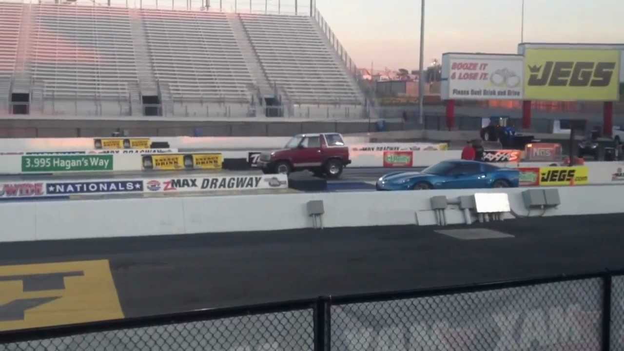 Daihatsu Rocky V8 crushes Z06 Vette @ ZMax Dragway (Hi Def)