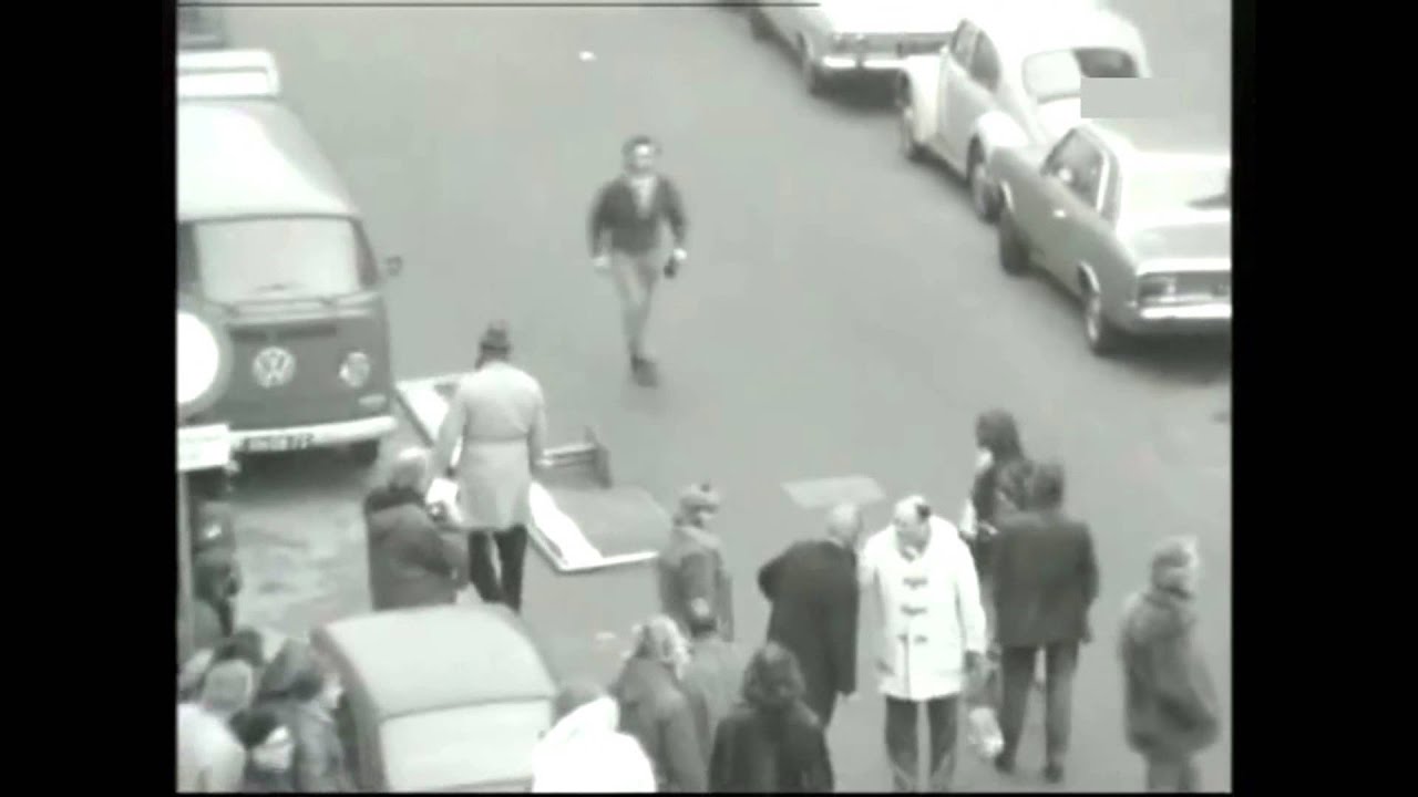 Amsterdam children fighting cars in De Pijp, 1972