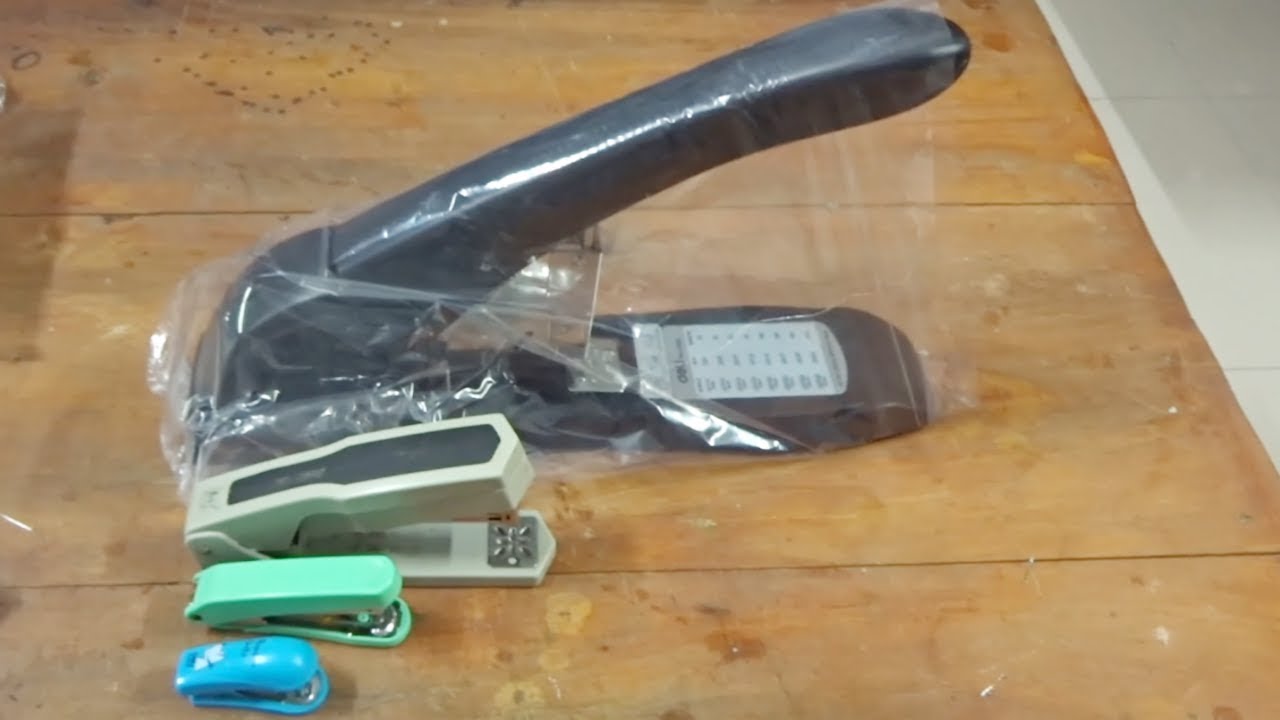 Đập hộp Máy dập gim đại Deli 0395