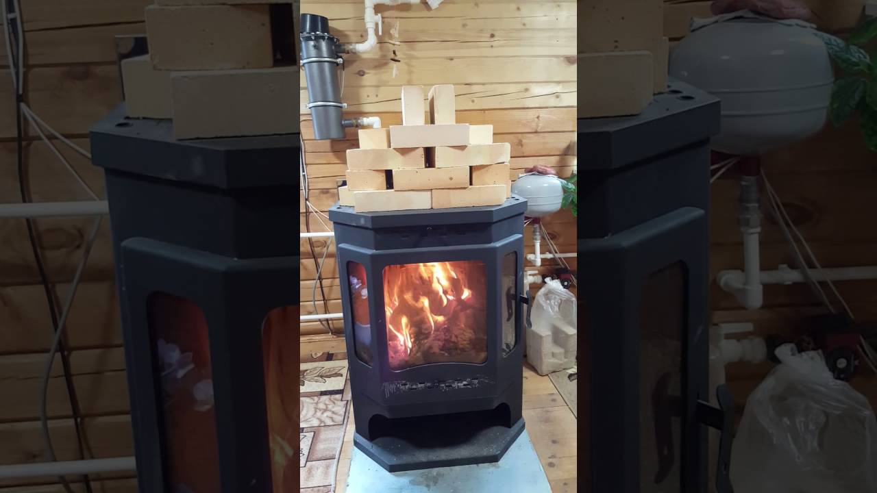 Печь камин +с водяным контуром. www.santguru.ru