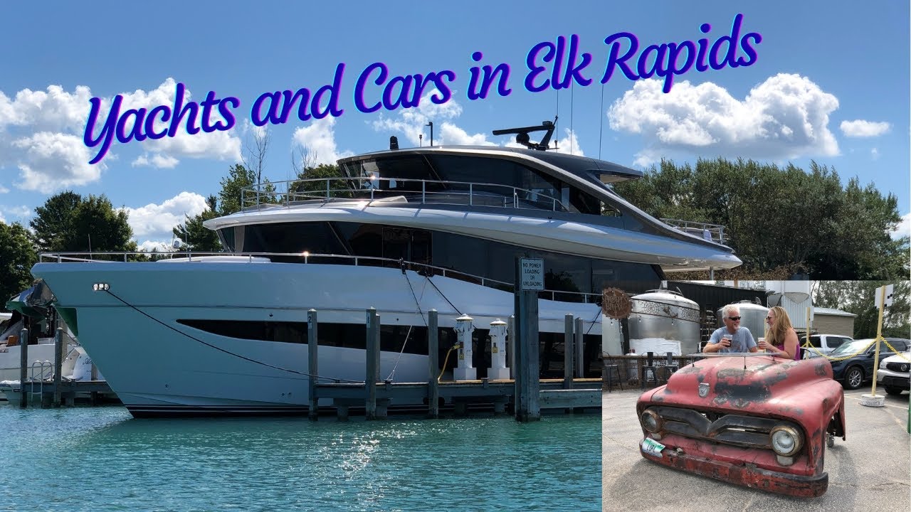 Yachts and Cars in Elk Rapids Michigan Freebird on The Great Loop