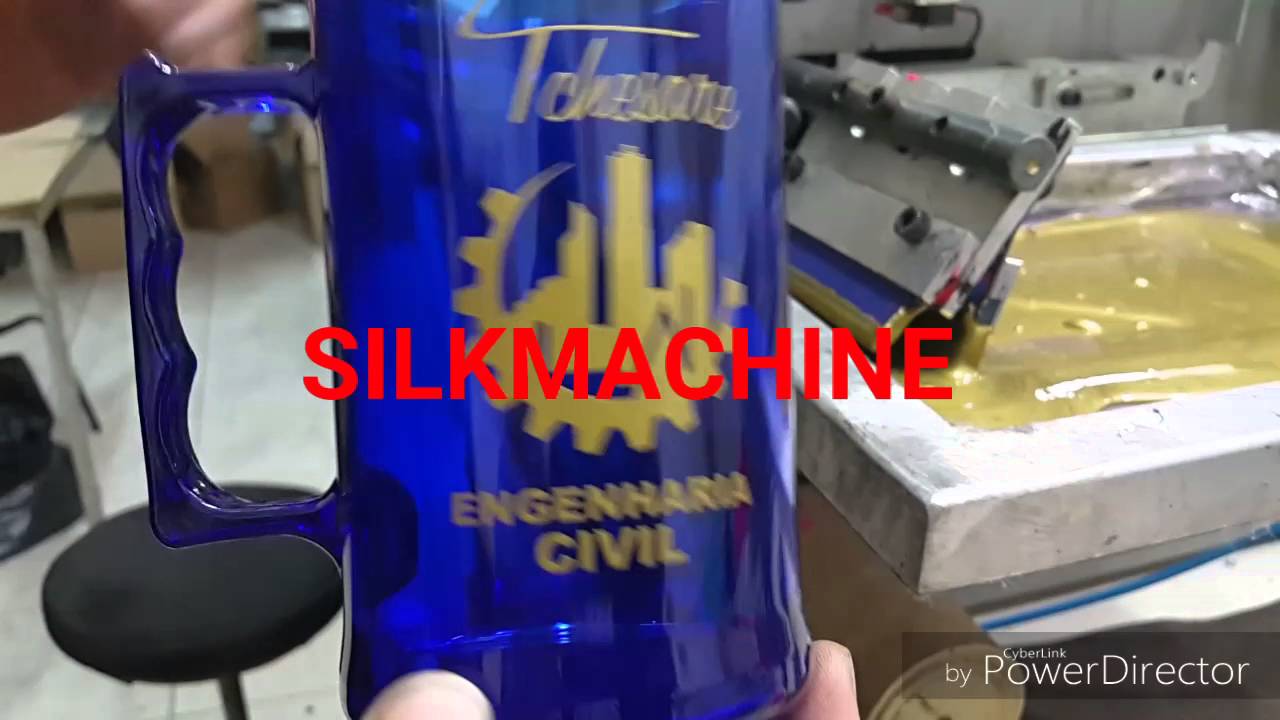 Silk Machine imprimindo em caneca de acrílico nos 2 lados ao mesmo tempo.