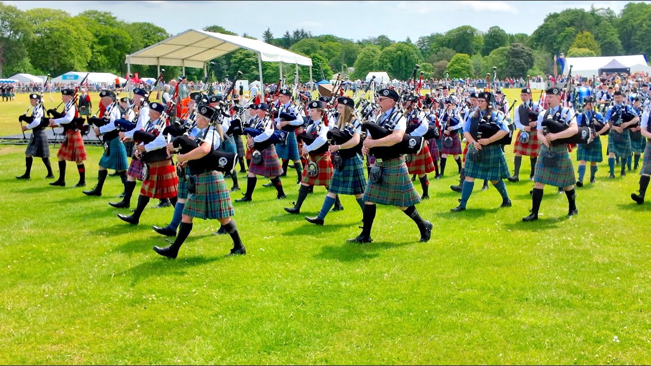 Drum Majors lead opening pipes & drums march and salute to Chieftain at 2025 Aberdeen Highland Games